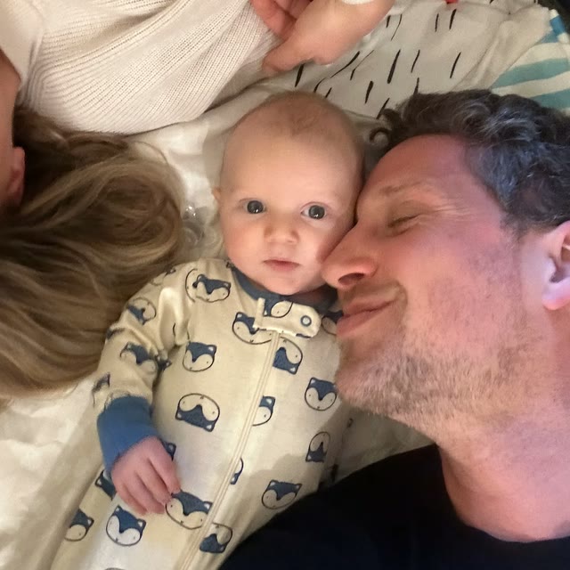 Ben with his wife and their baby