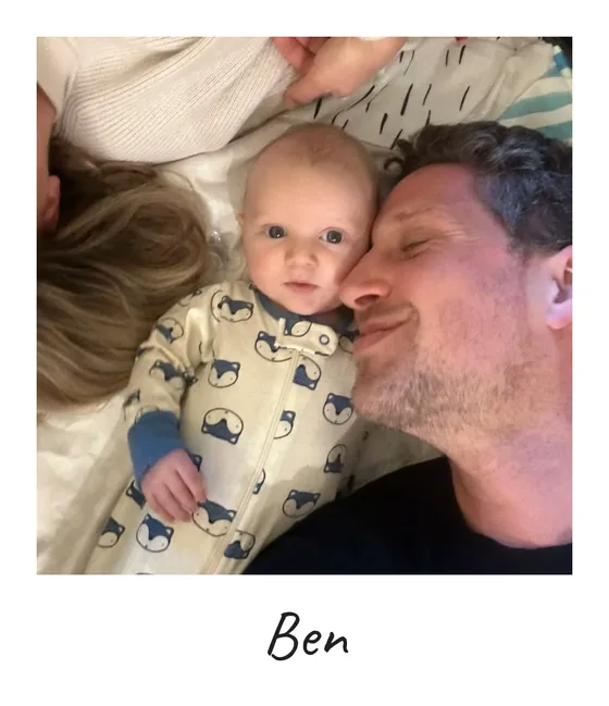 Polaroid of Ben Springwater holding a baby